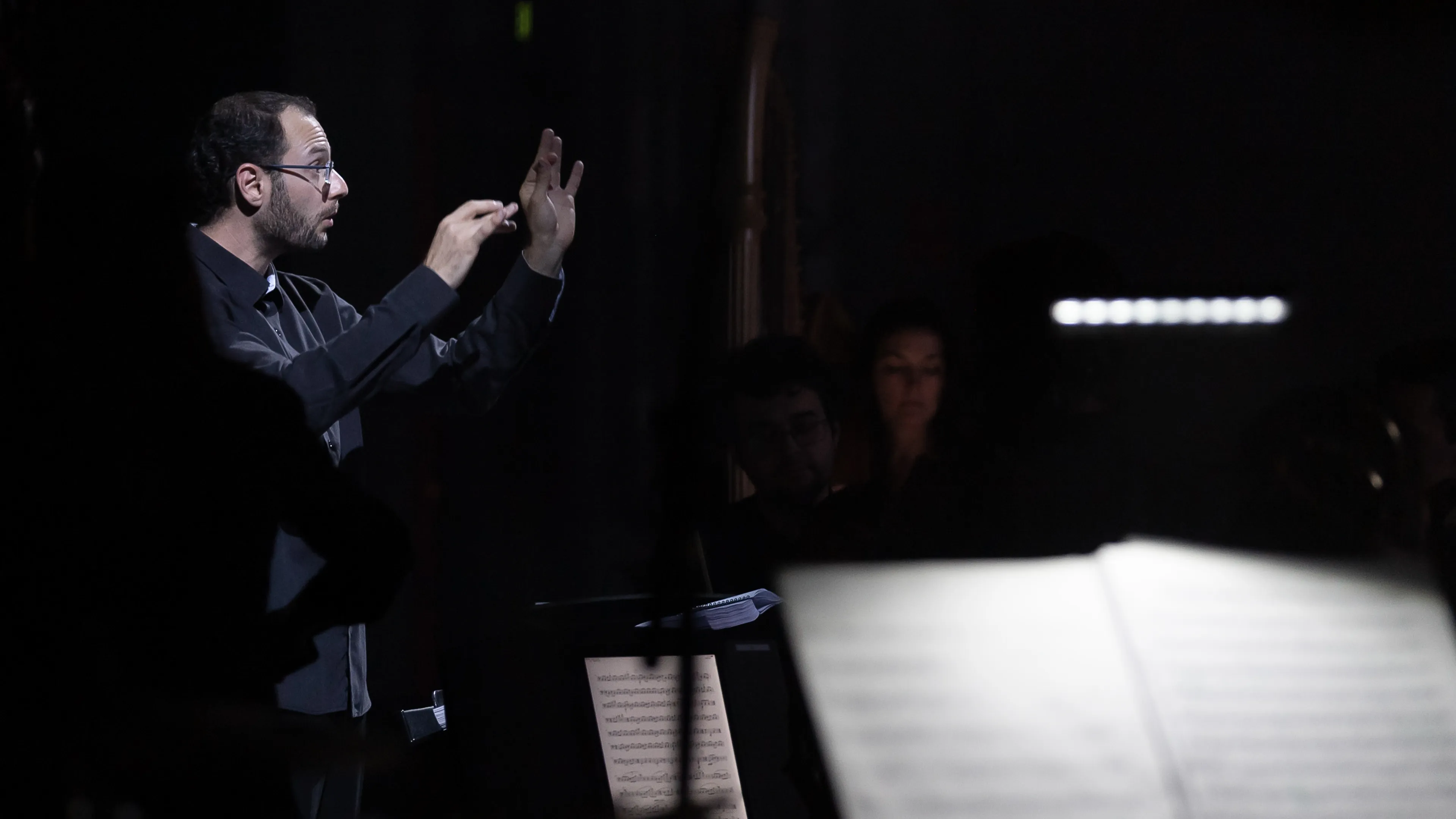 Jack Simmons conducting orchestra