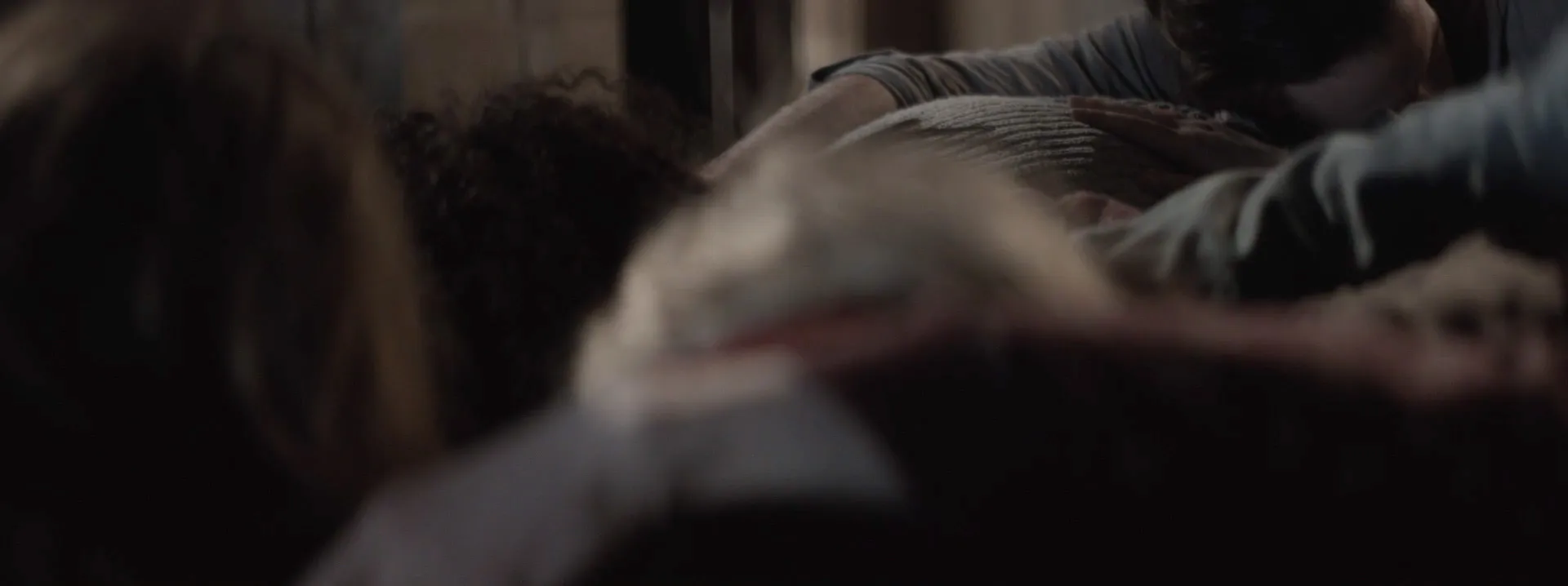 A close-up of bodies on top of one another.