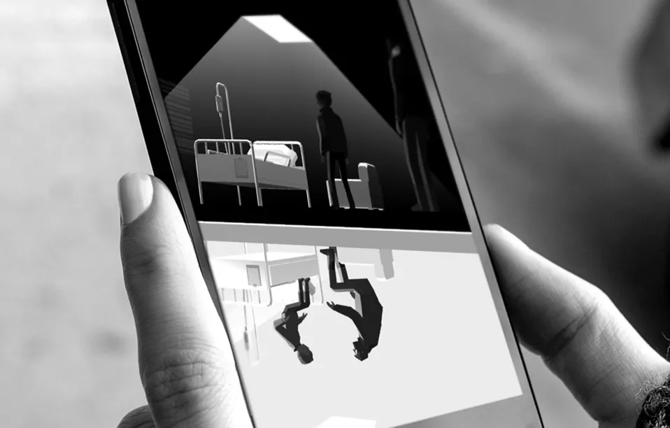 Close-up of a smartphone displaying a 3D scene of a person standing beside a hospital bed, viewed from two perspectives.
